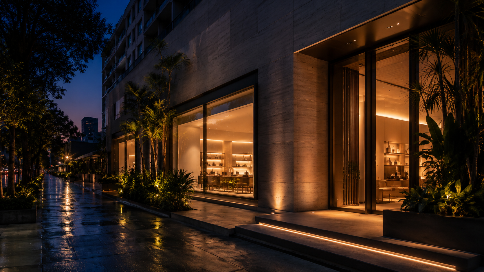 Fachada comercial iluminada à noite